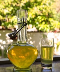Kumquat liqueur bottle and little glass