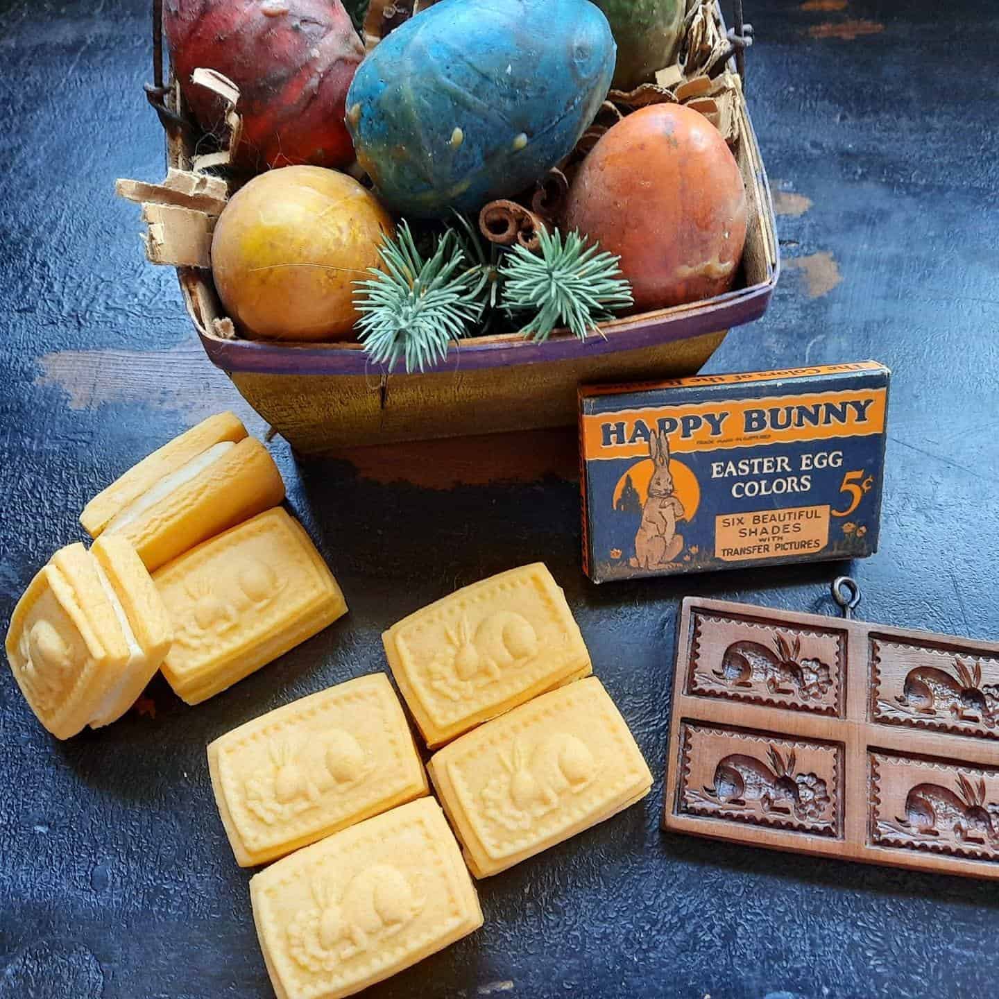 custard creams, mold and basket of colored eggs