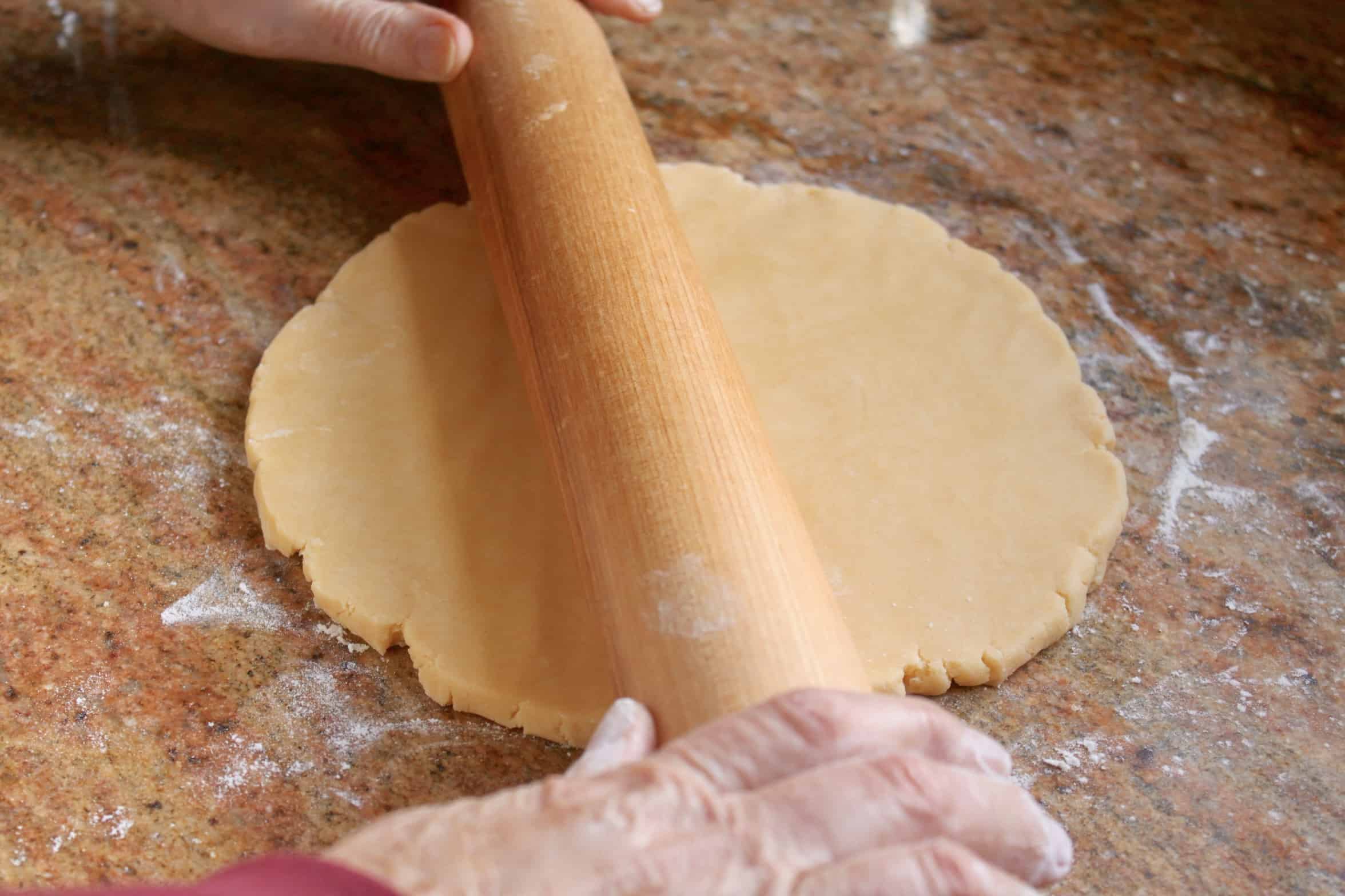 rolling out custard creams dough