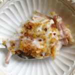 Swiss chard stems with provolone white sauce and breadcrumbs in a bowl