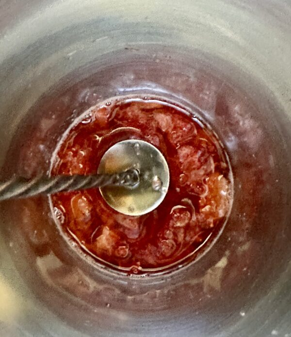 muddling strawberries