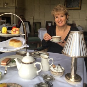 Christina having afternoon tea in England