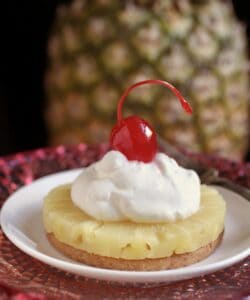 cherry on top of cream and pineapple