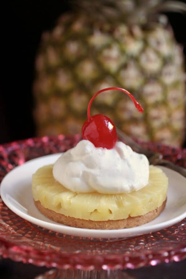 cherry on top of cream and pineapple