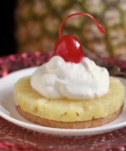 cherry on top of cream and pineapple
