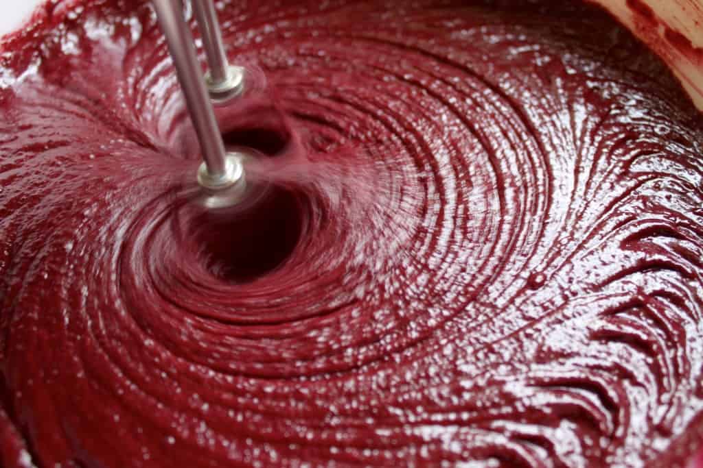 mixing chocolate beet cake