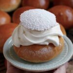 Semla in front of more Semlor
