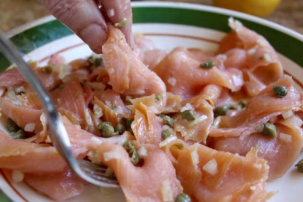 Mixing smoked salmon and other ingredients