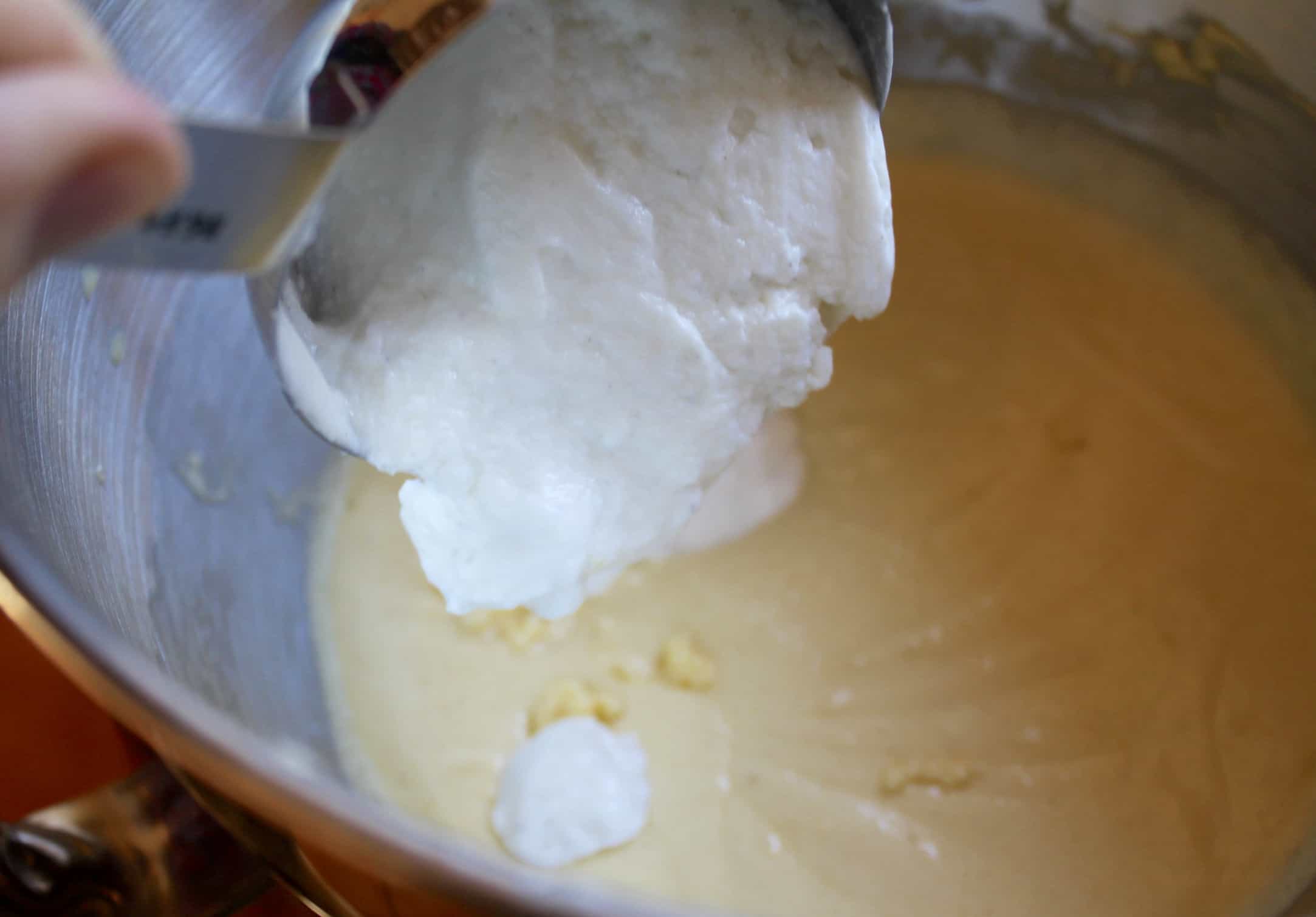 Adding yogurt to pear Cake