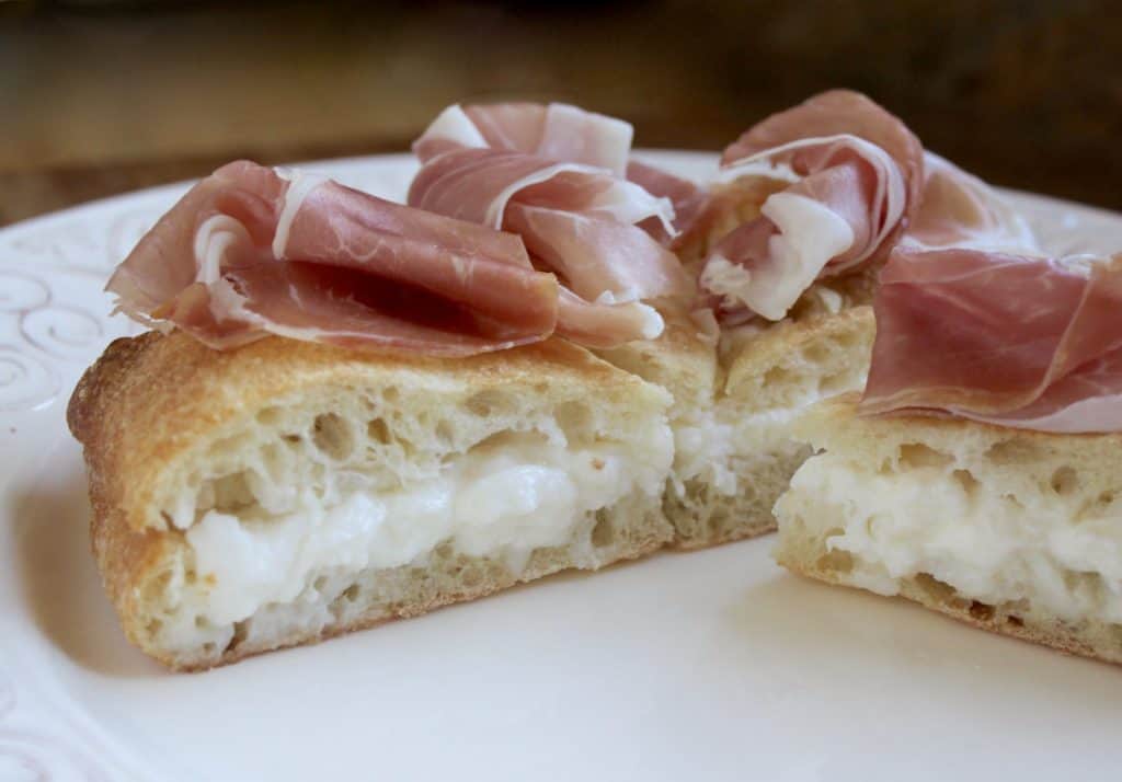 Focaccia with burrata and prosciutto