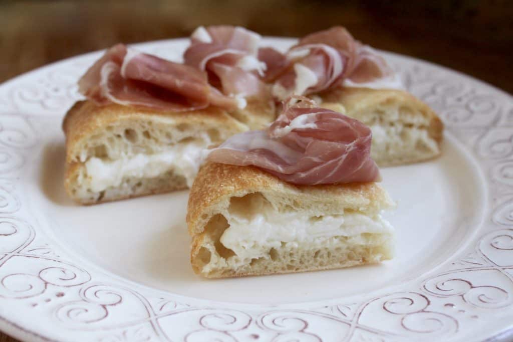 Focaccia with burrata and prosciutto