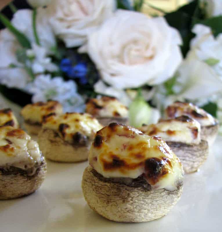 stuffed mushrooms with flowers in the background