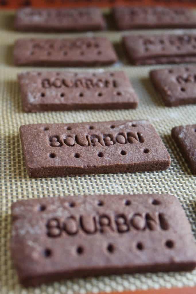 unbaked Bourbon Biscuits on a tray