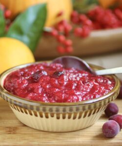 cranberry orange sauce with citrus in background