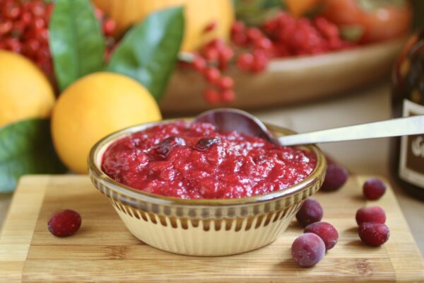 cranberry orange sauce with citrus in background