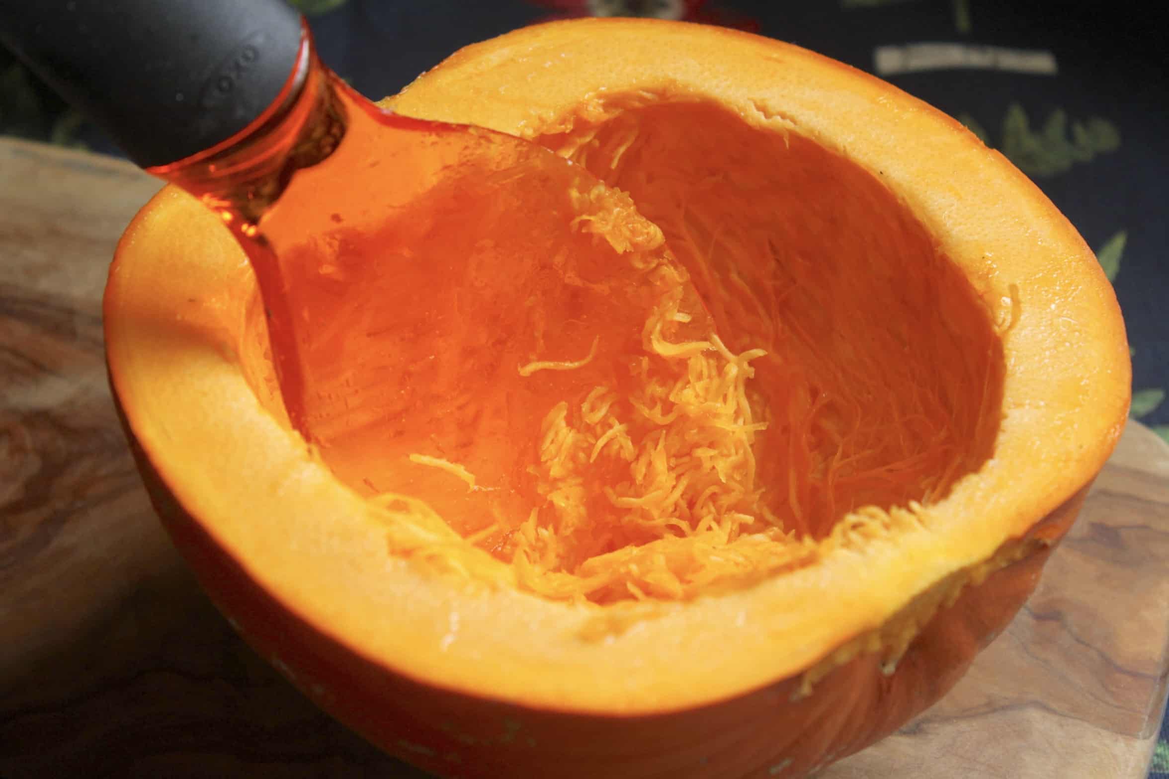 cleaning out a pumpkin
