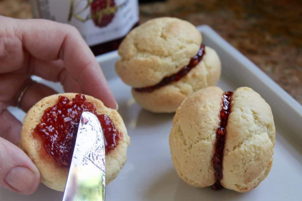 putting jam in the center of Scottish snowball biscuits