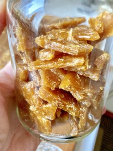 broken pieces of oat brittle in a jar