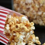 caramel popcorn spilling out of a bag