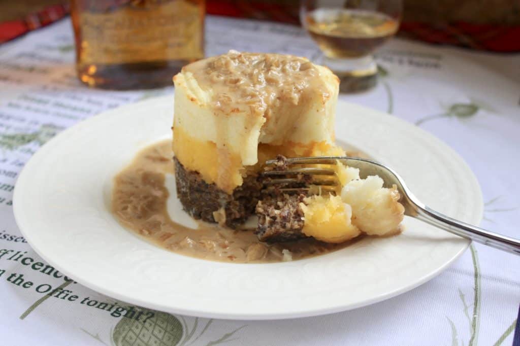 Haggis neeps and tatties stack tower with whisky sauce for a Burns Night menu