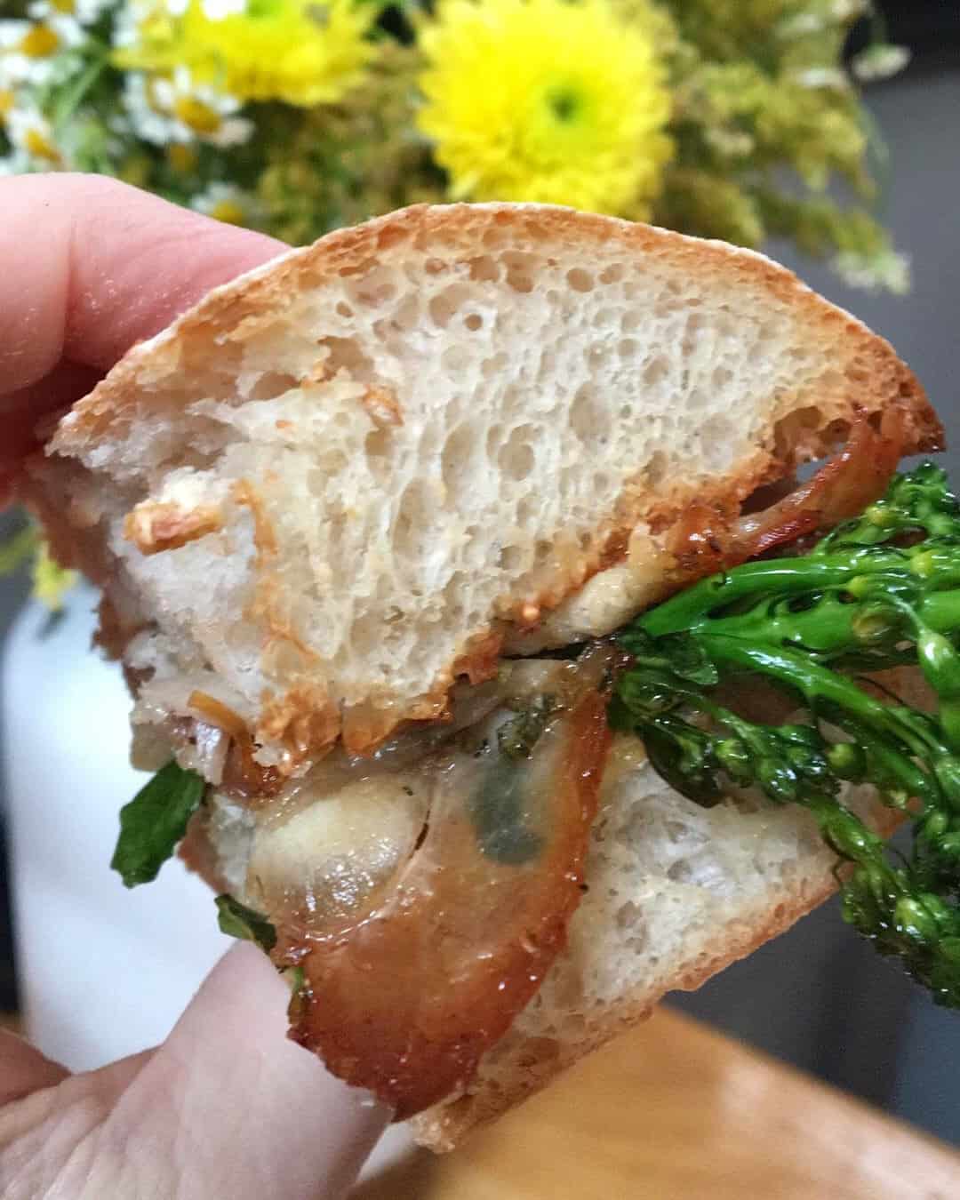 Porchetta and rapini panino