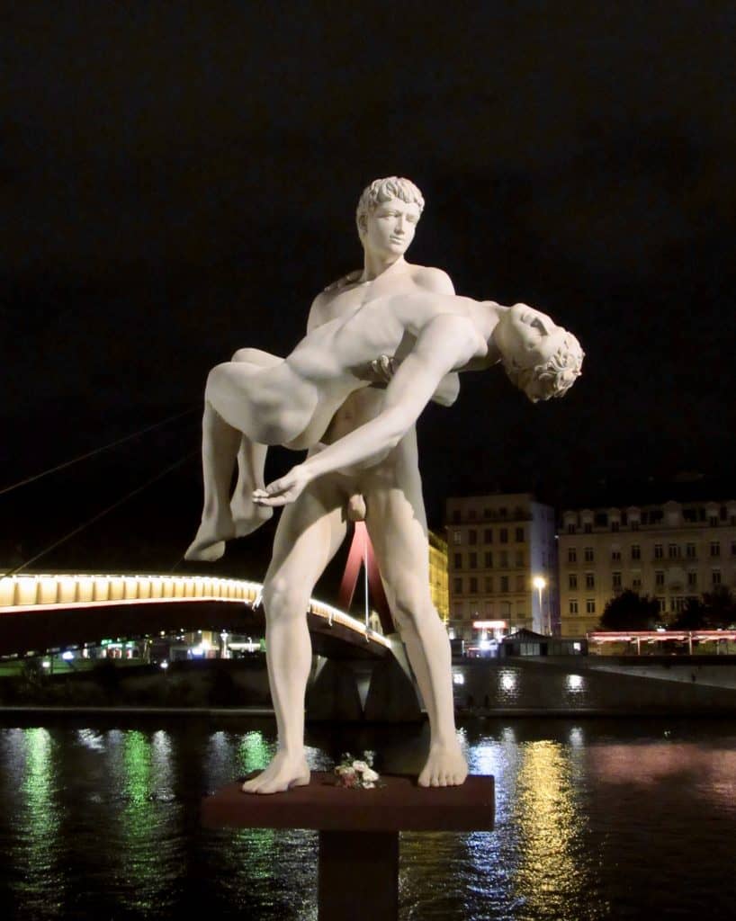 Lyon statue at night