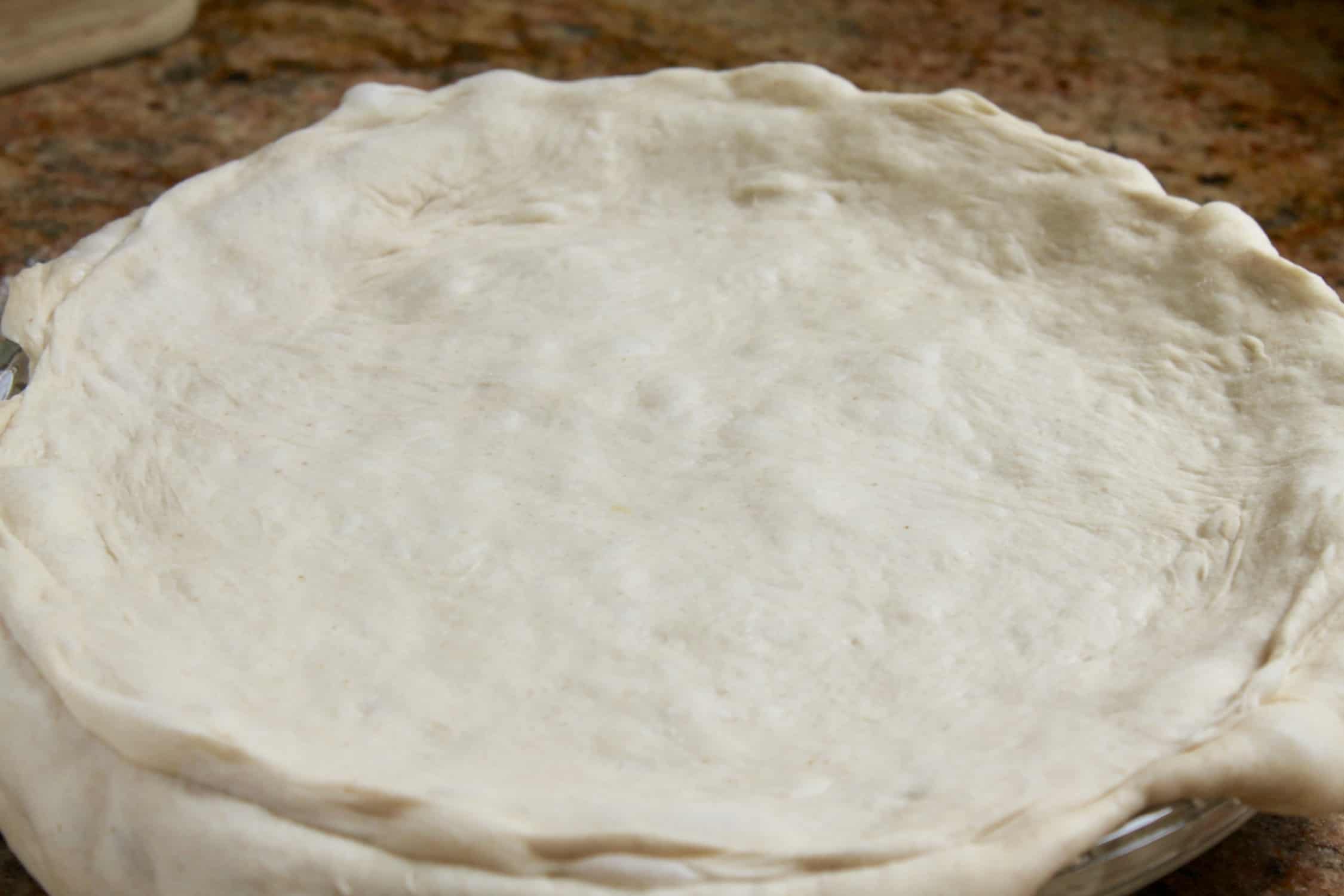 Filled pizza rustica ready to bake