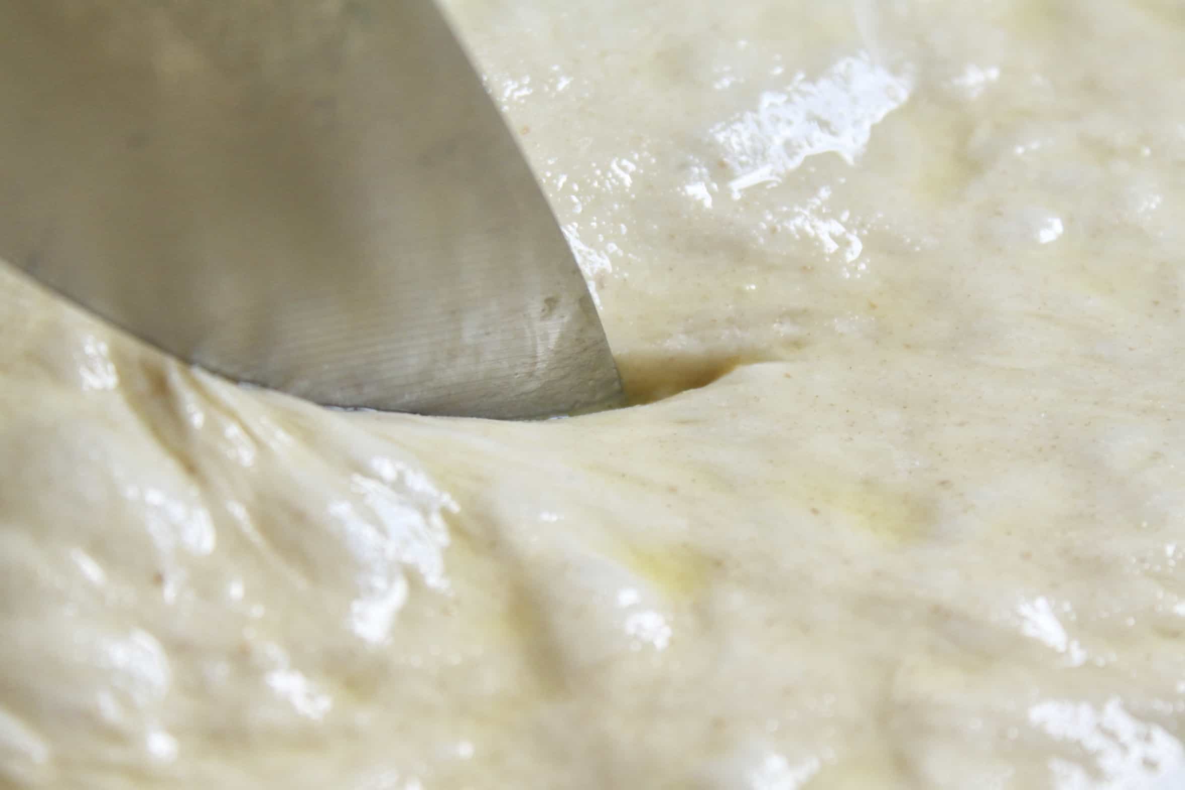 cutting a slit in the dough