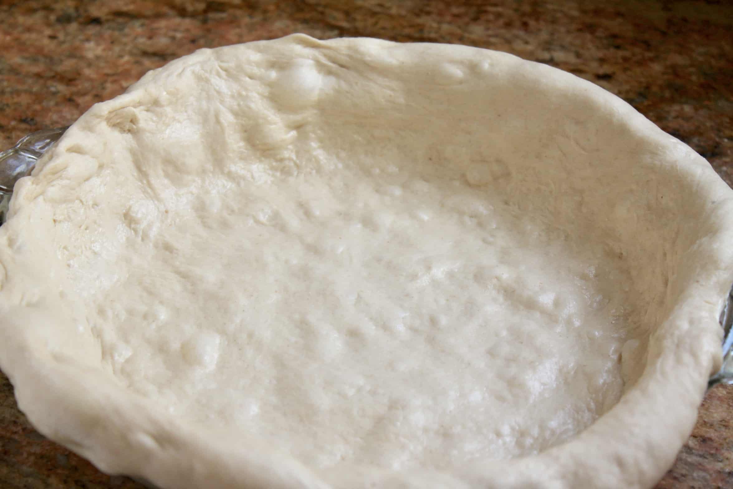 dough in pie pan