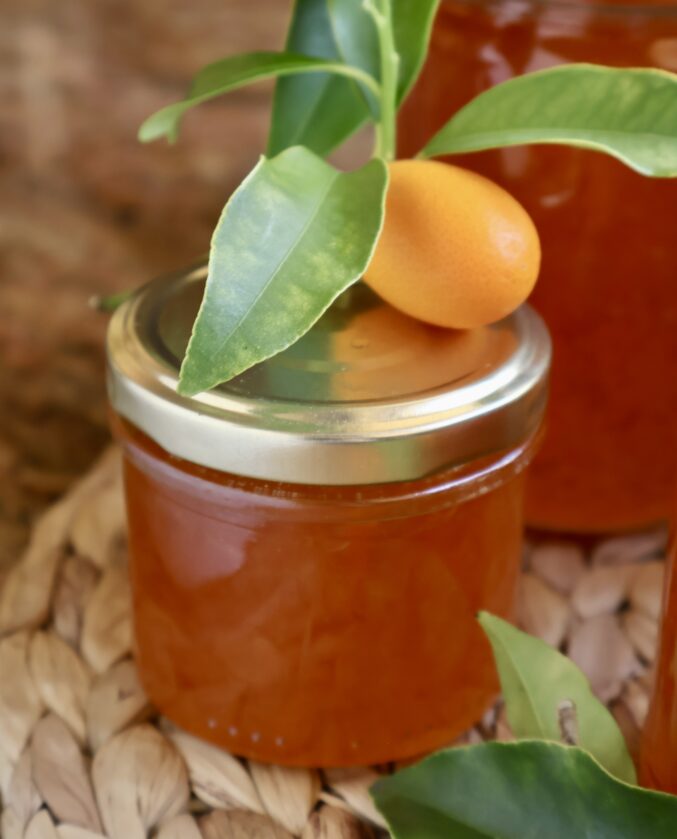 jar of kumquat jam with a fruit