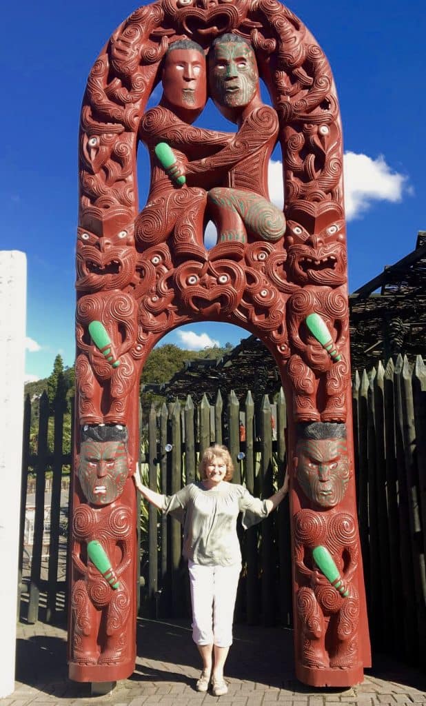 Christina inside a Maori arch