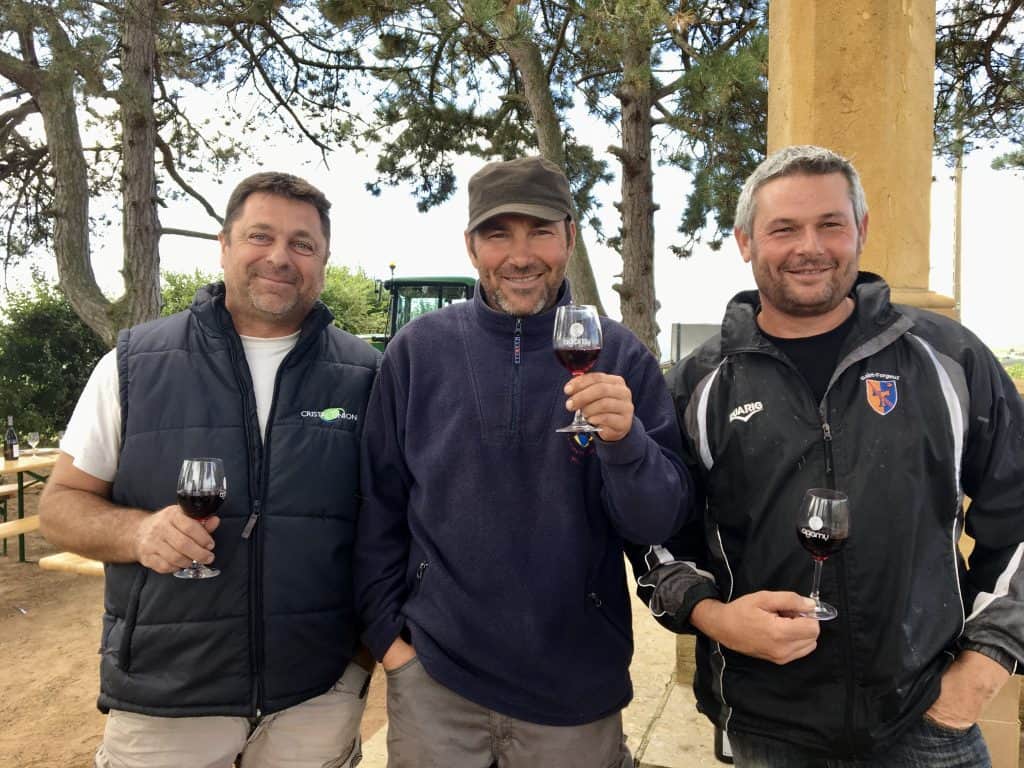 Agamy vintners enjoying wine with grilled Camembert on the barbecue