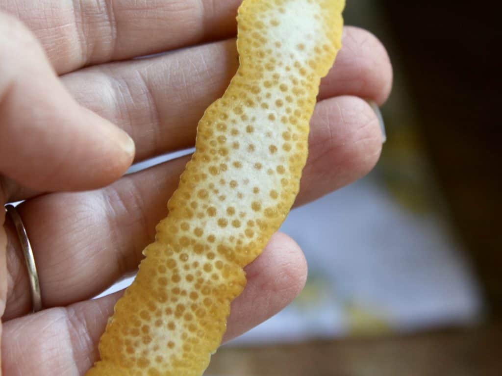 peeling Meyer lemon 