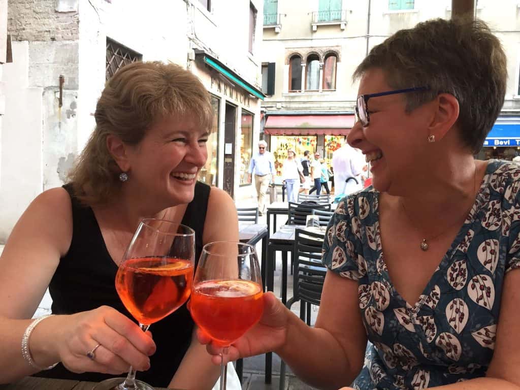 Christina and Janice with cocktails in Venice, Italy