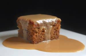 sticky toffee pudding on a white plate