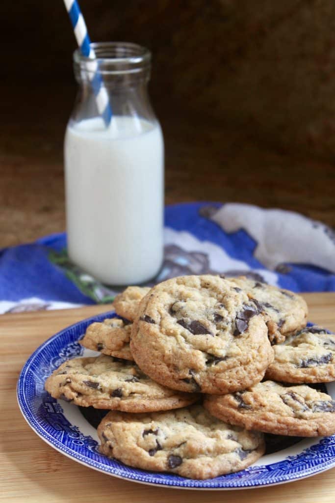 always perfect chocolate chunk cookies on a plate with milk