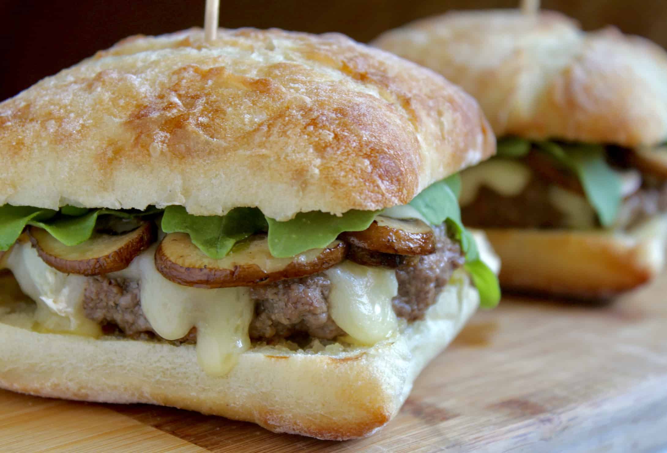 Brie and Truffle Burger with Mushrooms, Arugula and Crème Fraîche