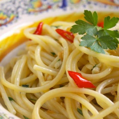 Spaghetti Aglio, Olio e Peperoncino (Spaghetti with Garlic, Oil & Chili) and The Ultimate Mediterranean Diet Cookbook by Amy Riolo