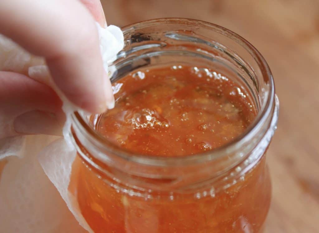 cleaning jar of Drambuie Marmalade