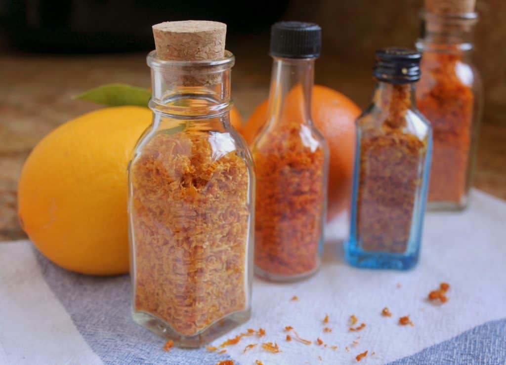 Dried citrus zest in bottles