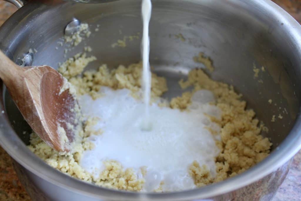 adding milk for bechamel sauce