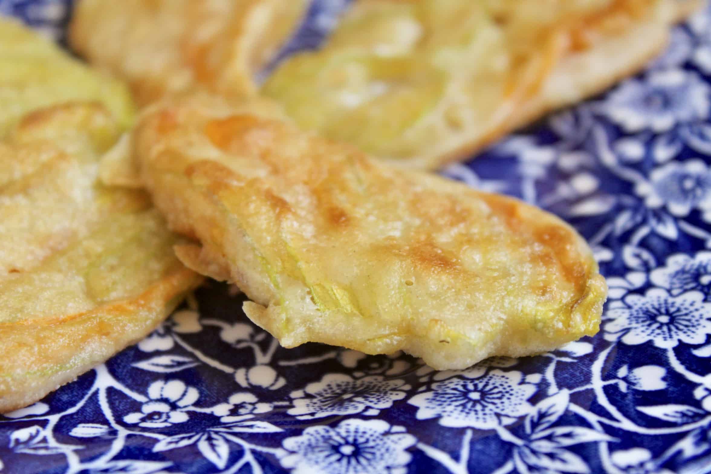 close up of a fried zucchini flower