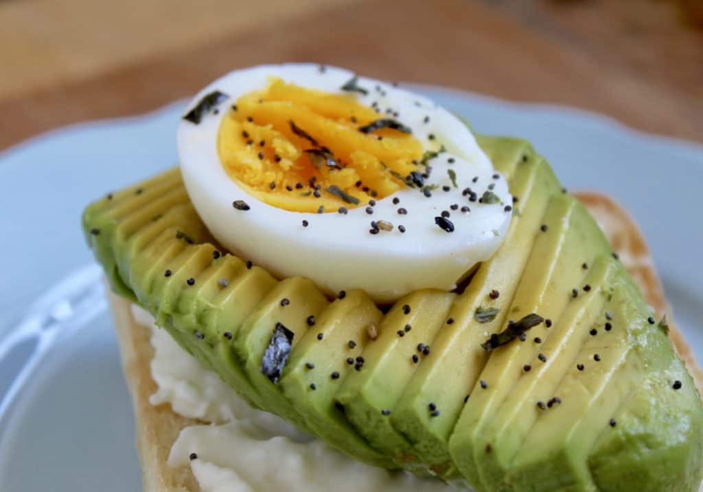 avocado toast with burrata and egg