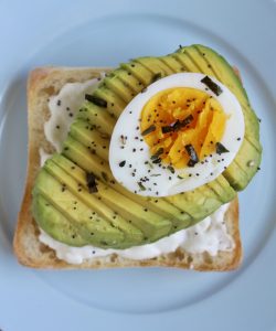 avocado toast with burrata and egg