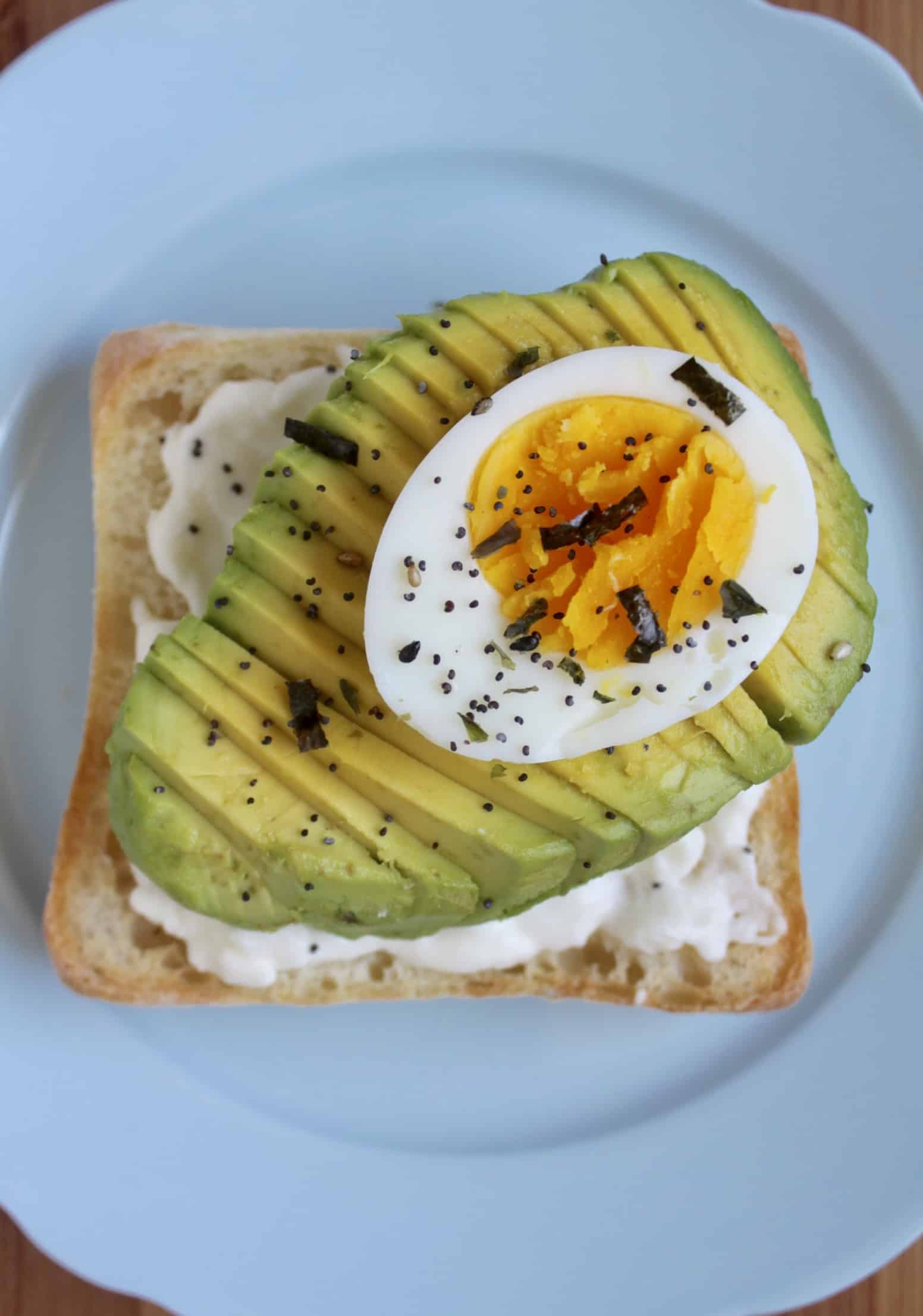 avocado toast with burrata and egg