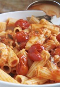 fish in tomato sauce with pasta