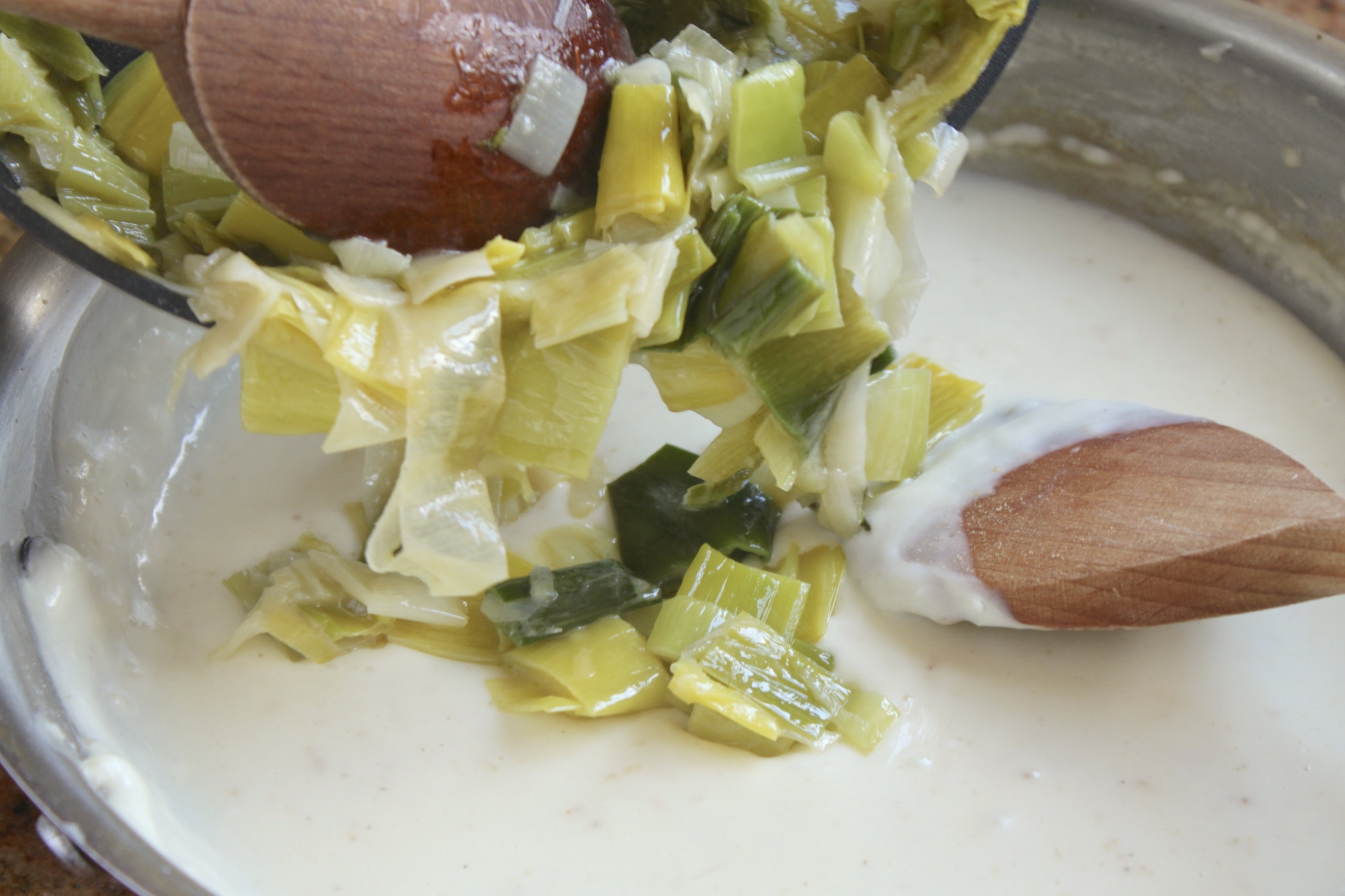 adding leeks to white sauce