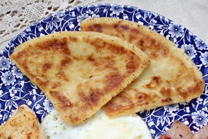 Irish potato bread on a blue plate