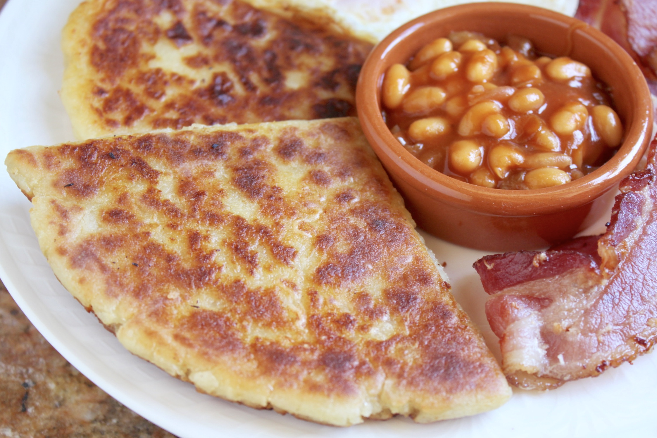 potato bread on plate with beans