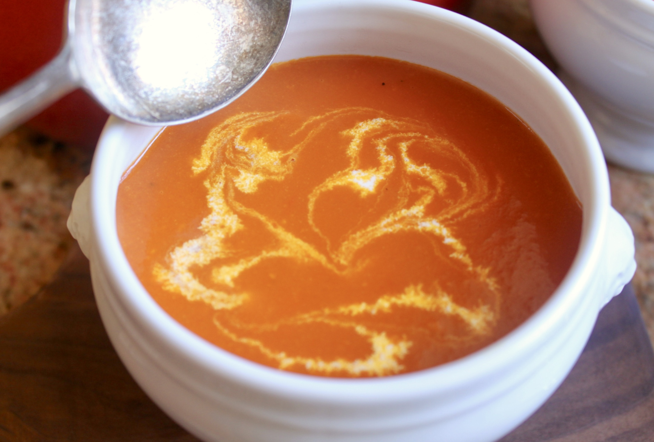 tomato turmeric soup in a bowl